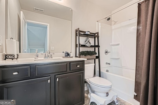 full bathroom featuring shower / bathtub combination with curtain, vanity, and toilet