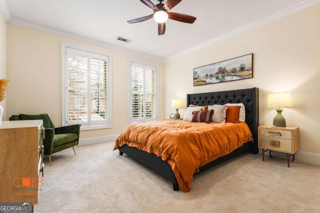 bedroom featuring light colored carpet, visible vents, and ornamental molding