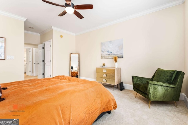 carpeted bedroom with crown molding, a ceiling fan, and baseboards