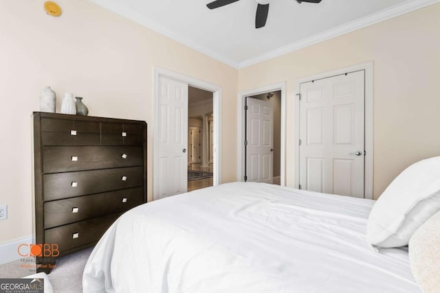 carpeted bedroom featuring crown molding, a ceiling fan, and baseboards