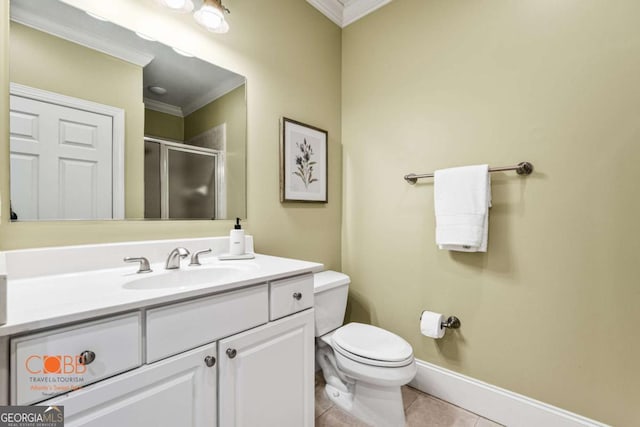 full bathroom with tile patterned floors, toilet, a stall shower, ornamental molding, and vanity