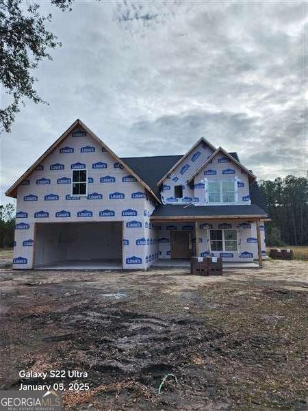 property in mid-construction featuring a porch