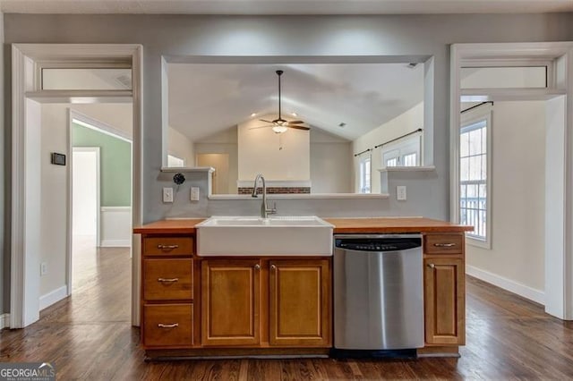 kitchen with dishwasher, lofted ceiling, sink, dark hardwood / wood-style flooring, and ceiling fan