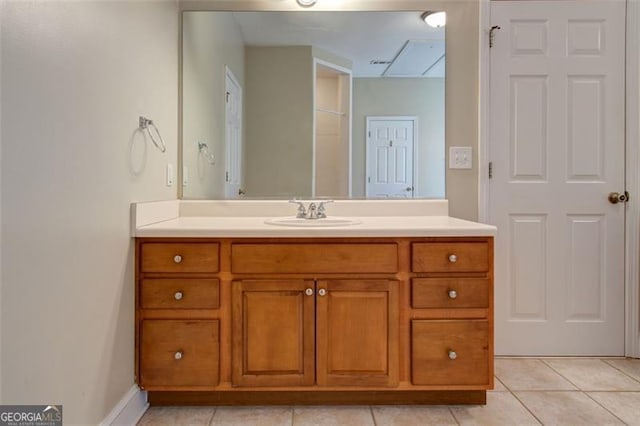 bathroom with vanity and tile patterned floors