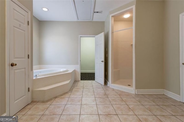 bathroom featuring tile patterned floors and plus walk in shower