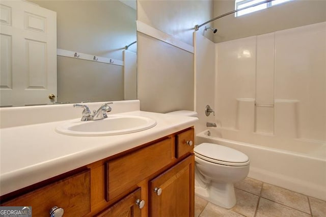 full bathroom with toilet, vanity, tile patterned flooring, and shower / bath combination