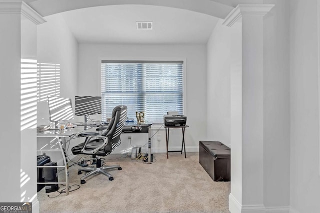 carpeted home office featuring lofted ceiling