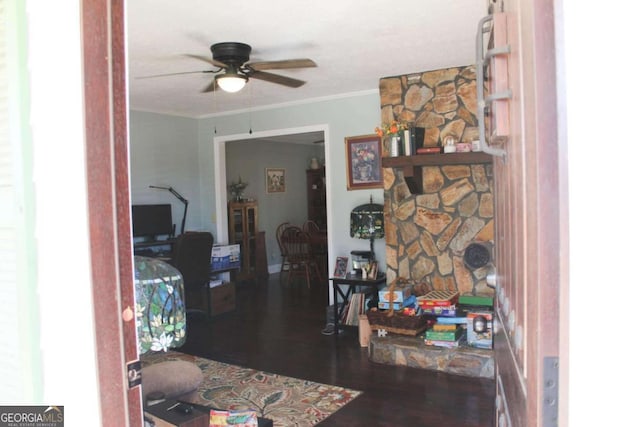 office with ceiling fan, dark hardwood / wood-style floors, and ornamental molding