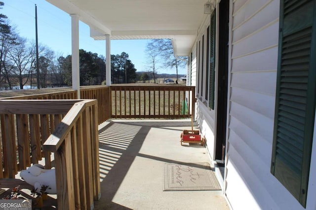 wooden deck featuring covered porch