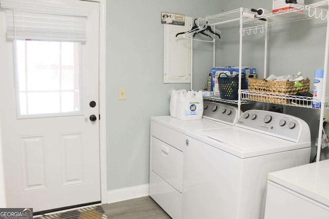 washroom with independent washer and dryer