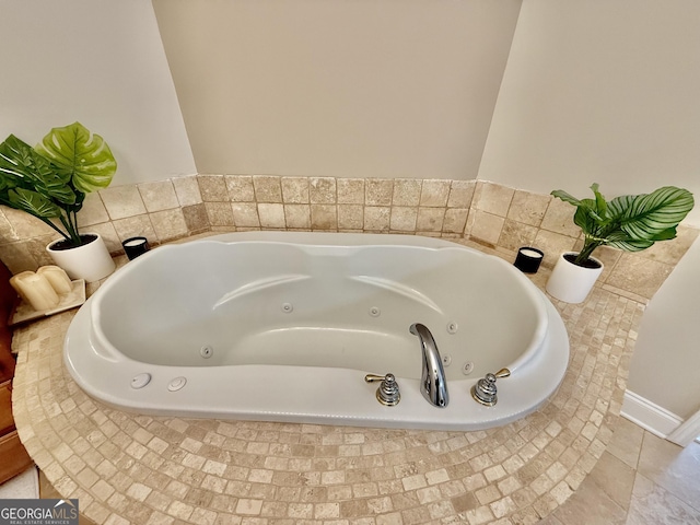 bathroom featuring a relaxing tiled tub