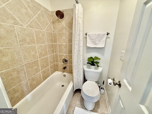 bathroom featuring toilet, tile patterned flooring, and shower / bath combo with shower curtain