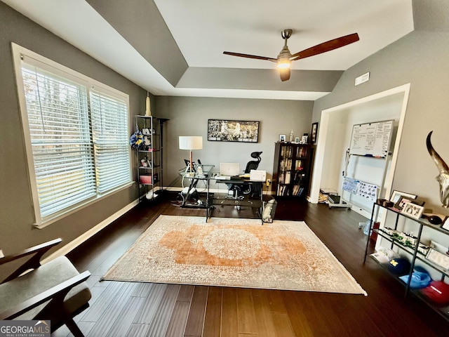 office space with ceiling fan and dark hardwood / wood-style floors