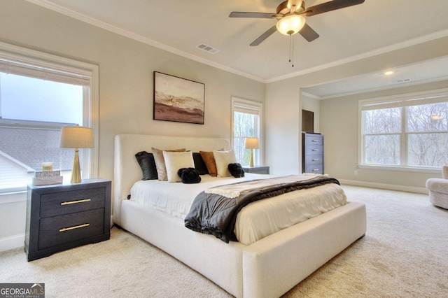 bedroom with ceiling fan, carpet, and ornamental molding