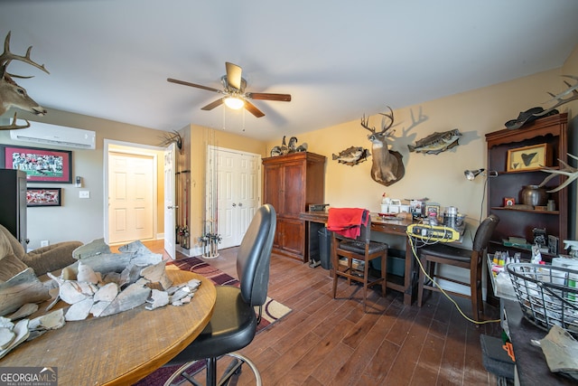 interior space featuring ceiling fan, dark hardwood / wood-style flooring, and a wall mounted AC