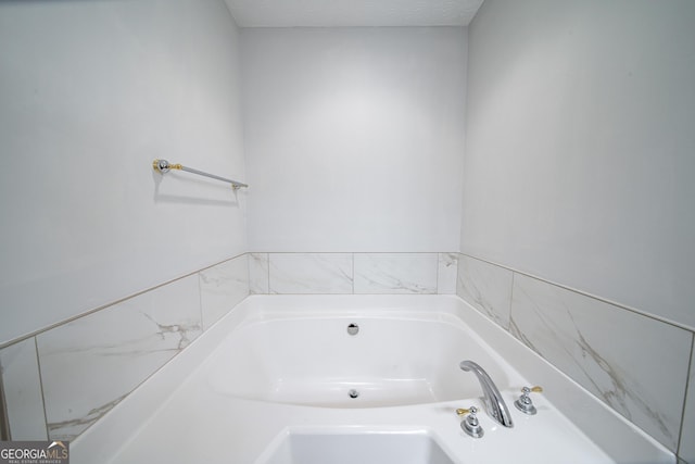 bathroom with a tub to relax in