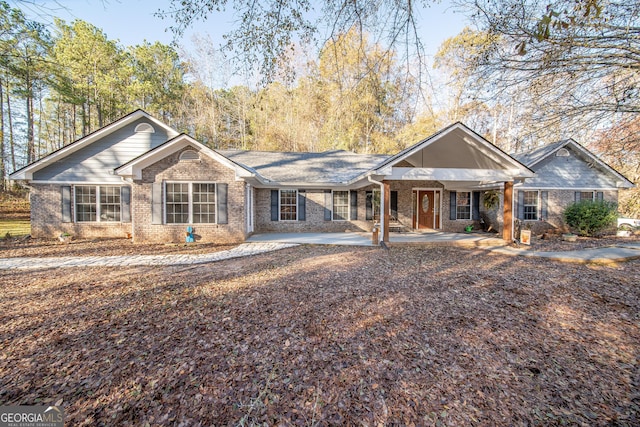 single story home featuring a patio