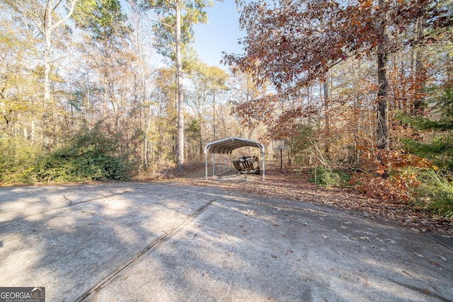 view of patio / terrace with a carport