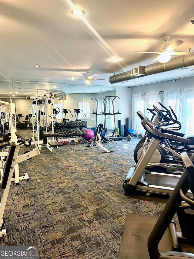 gym featuring carpet floors and ceiling fan