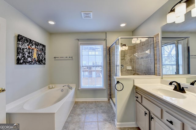 bathroom with vanity, tile patterned floors, and independent shower and bath