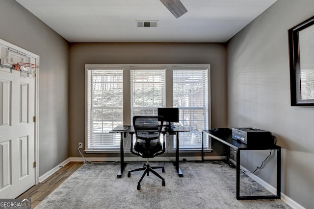 office with hardwood / wood-style floors