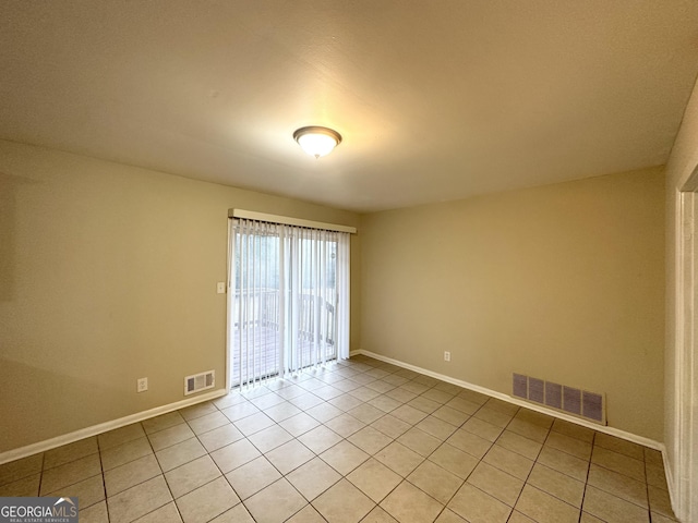 view of tiled empty room