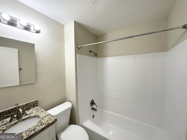 full bathroom featuring toilet, vanity, and bathtub / shower combination