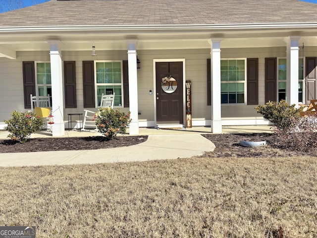 entrance to property with covered porch