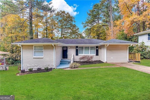 ranch-style home with a front lawn