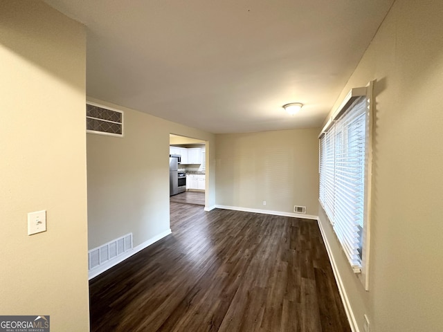 interior space featuring dark hardwood / wood-style flooring