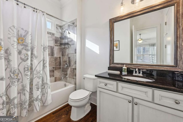 full bathroom featuring hardwood / wood-style flooring, toilet, vanity, and shower / bath combination with curtain