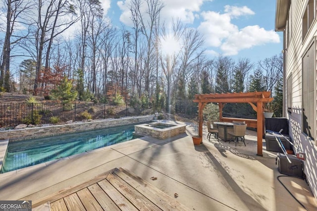 view of swimming pool featuring a pergola, a patio area, and a jacuzzi