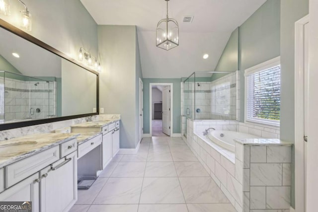 bathroom with vanity, vaulted ceiling, an inviting chandelier, and plus walk in shower