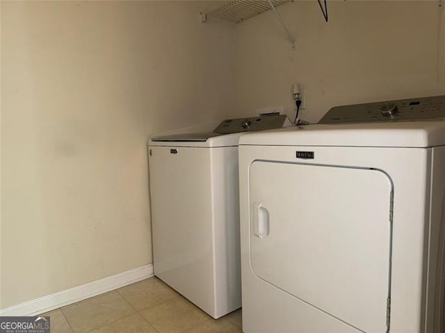 laundry area with washing machine and dryer