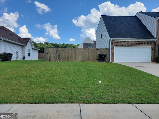 view of yard with a garage