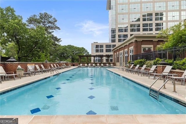 view of swimming pool featuring a patio