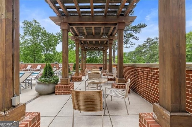 view of patio / terrace featuring a pergola