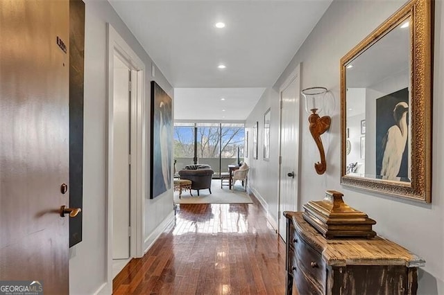 hallway with wood-type flooring