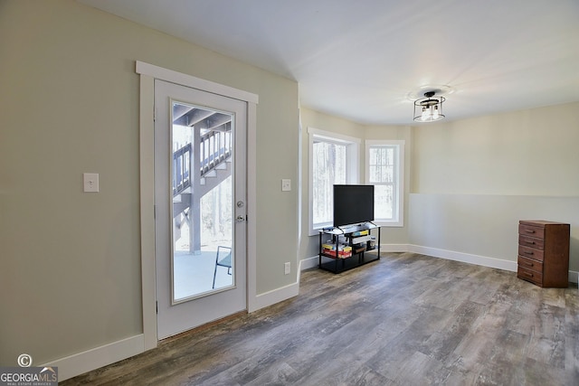 doorway to outside with hardwood / wood-style flooring