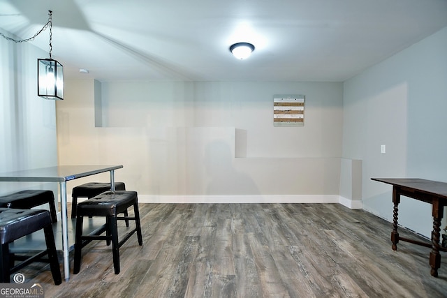 dining space featuring hardwood / wood-style floors