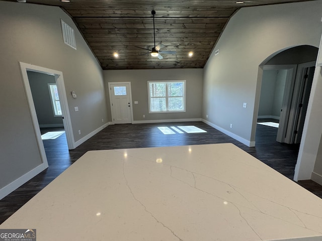 entryway with vaulted ceiling, wooden ceiling, dark wood-type flooring, and ceiling fan