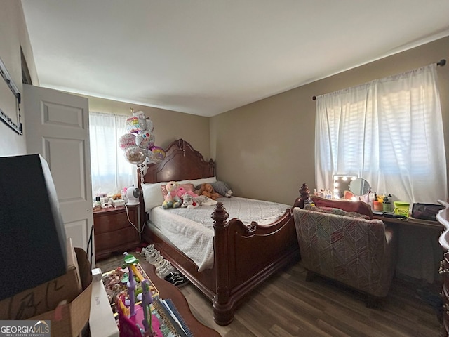 bedroom featuring hardwood / wood-style flooring