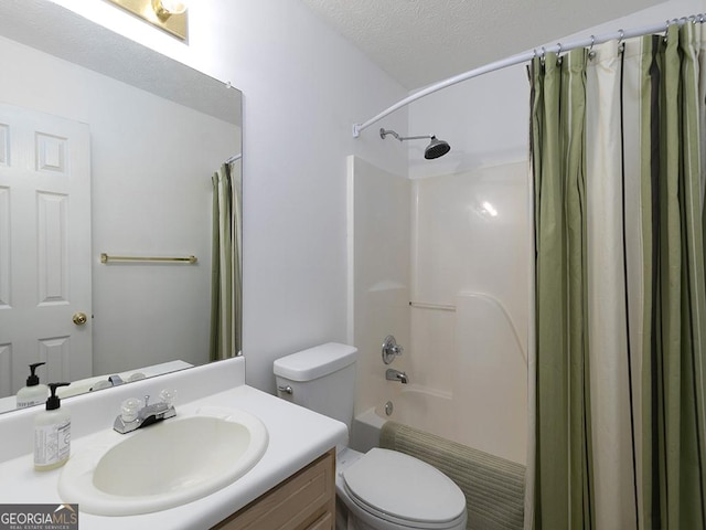 full bathroom with toilet, a textured ceiling, vanity, and shower / bath combo with shower curtain