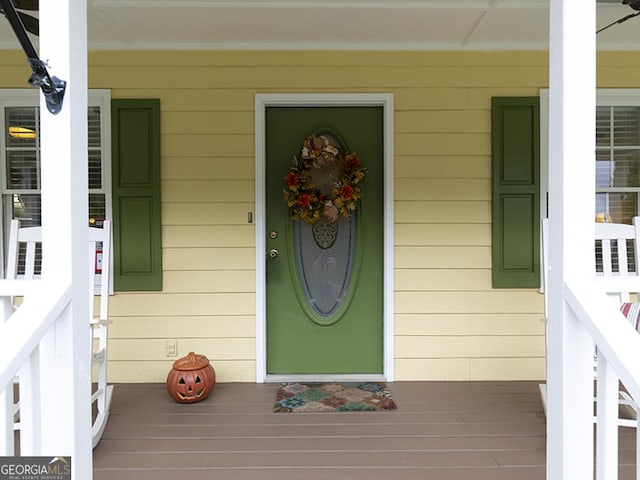 entrance to property with covered porch