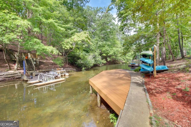 dock area featuring a water view