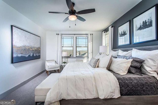 carpeted bedroom featuring ceiling fan