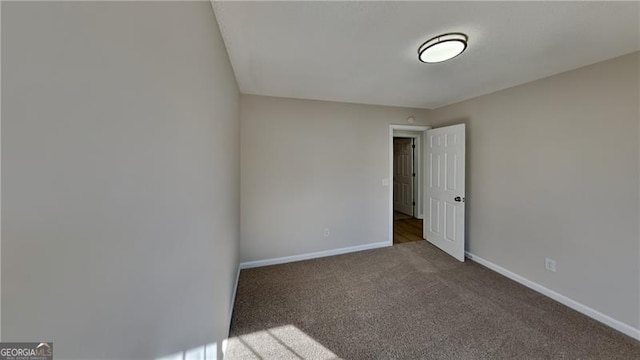 view of carpeted spare room