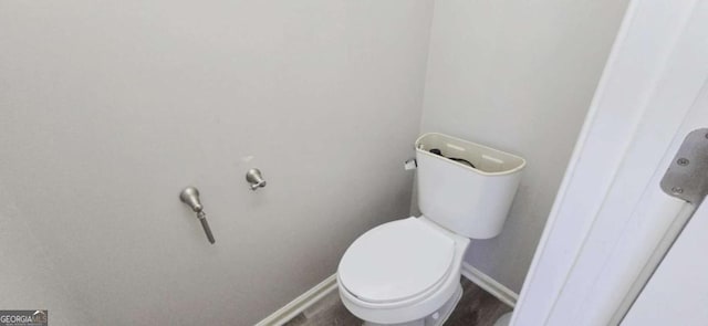 bathroom featuring toilet