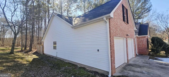 view of property exterior with a garage