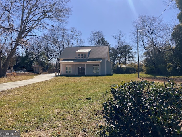 exterior space with a front lawn